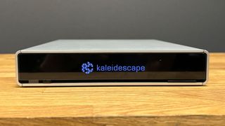 Kaleidescape Strato C and Terra Prime 8TB SSD showing Strato C unit on wooden bench